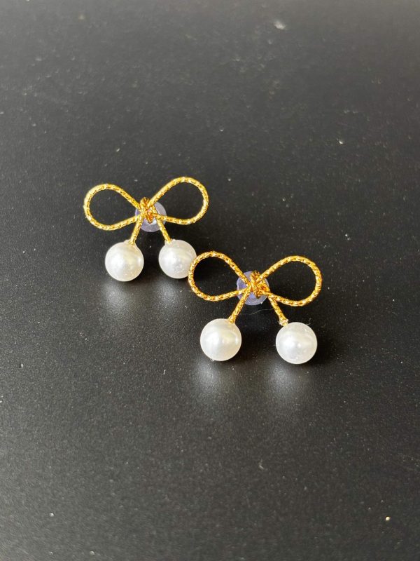 Gold Coated Winding Bow Earrings - Image 4